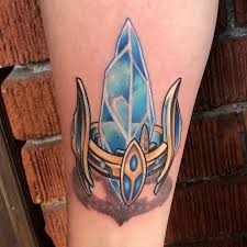 Image result for quirky pylon forehead tattoo
