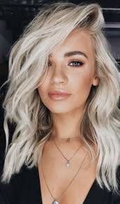 A color like this is quite versatile and can be brightened up or toned down to go with your skin tone or the season. How To Get The Platinum Blonde Of Your Dreams Hair Styles White Hair Color Platinum Blonde Hair