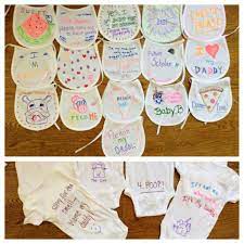 Pin By Laurie Brodsky On Baby Boom Baby Shower Onesie Baby Shower Activities Baby Shower Deco