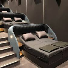 A Movie Theater In Switzerland Features Reclining Beds Instead Of Seats In 2020 Bed Cinema Home Cinema Room Cinema Room