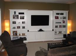 Measure and cut a spot out for the outlets. House Project Built In Entertainment Center The Style Files