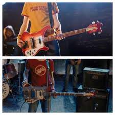 At the start of Scott Pilgrim vs The World (2010) Scott's bass guitar looks  normal, but after it gets blown up by Todd during their battle it is held  together by duct