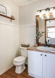 The toilet paper holder doubles as a cabinet door handle, and the narrow ledge above is perfect for a curated group of accessories. 8 Popular Bathroom Remodel Ideas And Trends For 2021