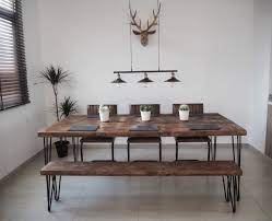 Rustic industrial style is fast becoming a trend where the electric wires are exposed, beams and sprinklers are not covered and even the big pipes installed for air condition and heater is laid bare. Diy Dining Table And Bench Rustic Industrial Home Edit