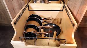 The top tier organizes lids and the bottom tier features adjustable dividers to store a variety of large pots and pans. 4cw2 Wood Tiered Cookware Organizer Overview Youtube