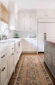 Many cabinets being combustible pose a greater danger unless there's adequate clearance between the range and the bottom of the upper cabinets. Kitchens With No Uppers Insanely Gorgeous Or Just Insane Emily Henderson