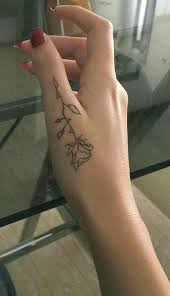 30 Simple And Small Flower Tattoos Ideas For Women Hand Tattoos For Women Flower Tattoo Hand Flower Wrist Tattoos