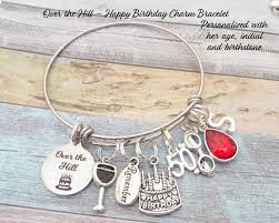 Suitable for a lady celebrating her important 50 year old birthday, this necklace which has five rings, which symbolise 5 decades, is a suitable piece of jewelry to give her best wishes for her birthday. 50th Birthday Gift Fiftieth Birthday Personalized Gift Birthday Jewelry Gift For Woman Turning 50 Gift For Her Woman Gift