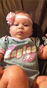 My granddaughter laughing at Daffy Dak.