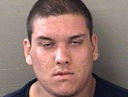 Two charged in armed robberies