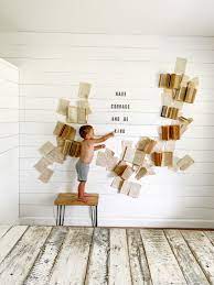 If you aren't sure how to weigh your art: How To Make An Epic Diy Book Wall Letter Board Display We Lived Happily Ever After