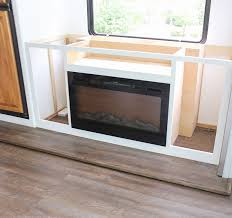 Outdoor basic infrared quartz electric fireplace stove with realistic flame 12h timer portable space heater with thermostat overheating protection. Installing A Tv Lift Electric Fireplace In Our Rv Fireplace Tv Lift Cabinet Electric Fireplace