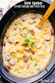 Slow Cooker Sausage And Potato Soup Is Filled With Andouille Sausage Cubed Potatoes Corn And Cheese The Perfe Soup Recipes Slow Cooker Recipes Soup Recipes