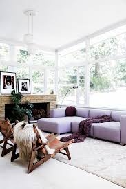 lilac plum and buttery leather armchairs combine to create a cosy vibe in this light filled living room livingroomdecorcosy