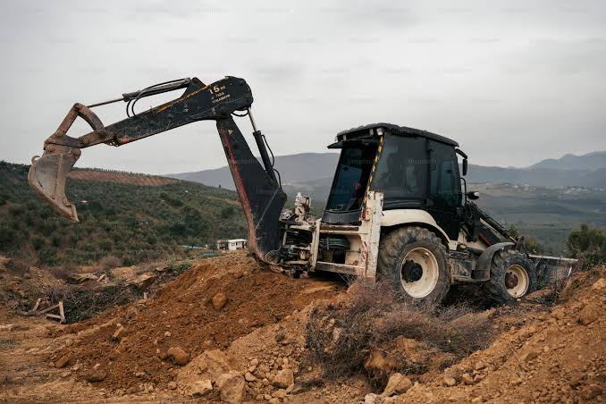 Excavadora en una ladera de Nuevo Cuscatlan