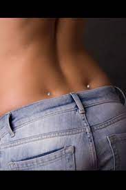 Back Dermal Piercing Want This Back Dimple Piercings Dimple Piercing Back Piercings