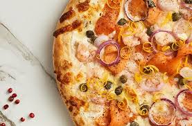 Ingredients By Saputo Seafood Lovers Won T Be Disappointed With This Smoked Salmon Pizza Complete Easy Pickling Recipes Smoked Salmon Pizza Sour Cream Pizza