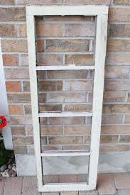Take an old window casing and build a rustic shelving unit around it! A Rustic Repurposed Window Frame Sustain My Craft Habit