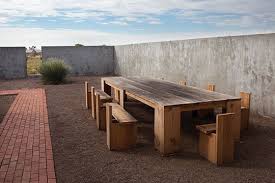 Donald Judd S Outdoor Dining Tables Rustic Outdoor Furniture Outdoor Dining Outdoor Dining Table