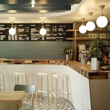 Kiosk Design Pendant Globe Lights Subway Tile Painted Brick Cafe Decor Restaurant Design Inspiration Restaurant Design