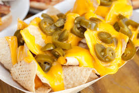 More elaborate versions of the dish include other ingredients. Man Dies From Eating Gas Station Nacho Cheese Eater