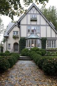 How Do You Paint A Tudor Style Home The Decorologist Tudor House Exterior Tudor Style Homes Tudor House