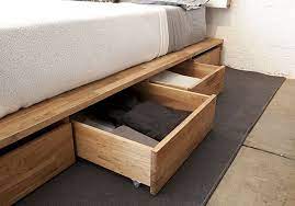 How do i build a bed with storage space underneath it? Minimalist Wooden Decor Offers Organic Small Space Solutions Bed Storage Drawers Underbed Storage Drawers Under Bed Storage