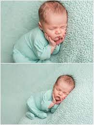 Newborn In Mint Green Romper Bean Bag Pose Iowa Newborn Photographer Cb Studio Newborn Baby Inspiration Newborn Photographer