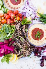 Top with a bit of lettuce and tomato and chicken shawarma. Grilled Lamb Shawarma Platter Recipe Two Purple Figs