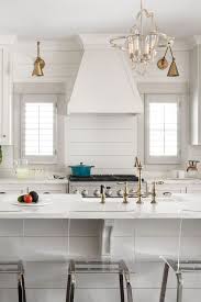 Modern Farmhouse Kitchen With Shiplap Backsplash White Farmhouse Kitchen With S Farmhouse Kitchen Backsplash Modern Farmhouse Kitchens Farmhouse Style Kitchen