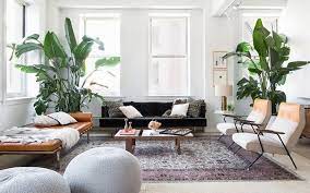 Stylish kitchen interior with modern cabinets and stainless steel appliances in new home. The New York Capsule 8 Decor Pieces Every Style Pro In The City Owns Living Room Scandinavian Living Room Decor Interior Design