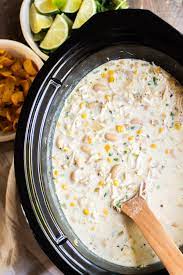 Step 1 layer chicken, great northern beans, and corn into a slow cooker. Slow Cooker White Chicken Chili The Magical Slow Cooker