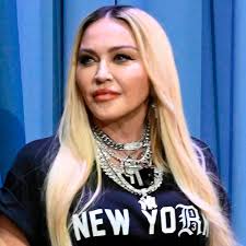 Madonna says her son David Banda 'looks better' in her clothes than she  does