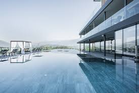 Infinity Pool South Tyrol In The Alps Breathtaking View From This Luxury Outdoor Pool Hotel Winkler A Selected Hotel Hotel Hotel Place Unique Hotels