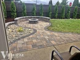 Stone pathway in garden, brick sidewalk. Paver Stone Patio Installation Vulcan Design Construction