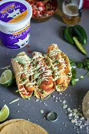 8 fish tacos with avocado sauce. Crunchy Fish Tacos With Avocado Lime Sauce Urban Bakes