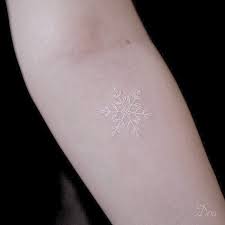 A great example of pale skin with a white skin tattoo, it still works. 110 White Snowflake Tattoo Designs With Meanings 2021 Icy Winter Ideas