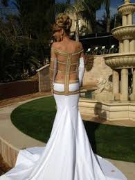 The egyptian goddess costume includes a teal and black, ruched side tube dress with peplum detail, metallic gold belt, long mesh train, metallic gold sleeves with long ancient egyptian themed wedding invitation. 48 Egyptian Wedding Ideas Egyptian Wedding Dresses Gowns