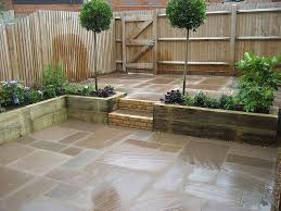 Small Courtyard Garden For Entertaining And Easy Plant Maintenance Raised Sleeper Planting Beds Indian Sandstone Paving Courtyard Gardens Design Small Courtyard Gardens Courtyard Garden