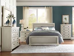 It includes two nightstands and one bed, all made from a blend of solid and engineered wood in a neutral hue. Shop Bedroom Furniture Sets Badcock Home Furniture More