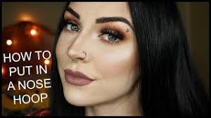 A ball creates more stability but may cause some pain if the hole of your nose piercing isn't big enough to accommodate the ball. How To Put In Take Out A Nose Hoop Youtube