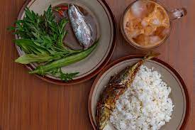 While there is a variety of nasi ulam across indonesia, malaysia and southern thailand. Nasi Rice With Budu Anchovies Sauce And Ulam Herbs And Vegetable Is The Kelantan Cuisine Stock Photo Adobe Stock