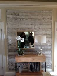 Each piece of wood is carefully arranged and fitted to create a column or completely cover one aspect of the wall. Pin On Recycled Wood Panel