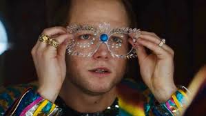 Directed by dexter fletcher and written by lee hall, it stars taron egerton as elton john, with jamie bell as bernie taupin, richard madden as john reid, and bryce dallas howard as sheila eileen. Rocketman Producers On Elton John Biopic Premiering In Cannes Variety