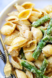This cheesy chicken and asparagus pasta is one the whole family will love. Creamy Chicken Asparagus Shells And Cheese Recipe Diethood Recipes Pasta Dishes Cooking Recipes