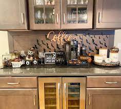 You can put the coffee machine and plant on the countertop, hang some mugs, and don't let the countertop too plain by adding some wooden wall arts. The Top 78 Coffee Station Ideas