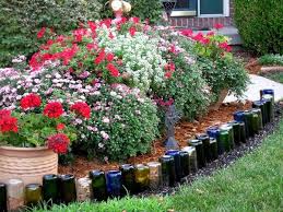 How to build a glass bottle garden wall. Diy Wine Bottle Ideas For Garden 26 Empty Wine Bottle Projects Bottle Garden Wine Bottle Garden Garden Borders
