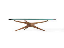 Some light wear and fading to top as seen in photos. Sculpted Coffee Table Holly Hunt