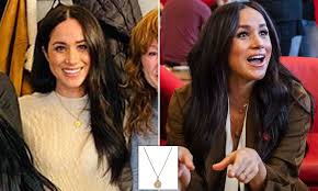 Meghan markle's jewelry style can be summarized in a few words: Meghan Markle Wears Necklace With Prince Harry S Zodiac Sign Daily Mail Online