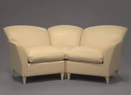 The couch is upholstered in a light yellow leather. Couch From The Set Of The Oprah Winfrey Show Because Of Her Story